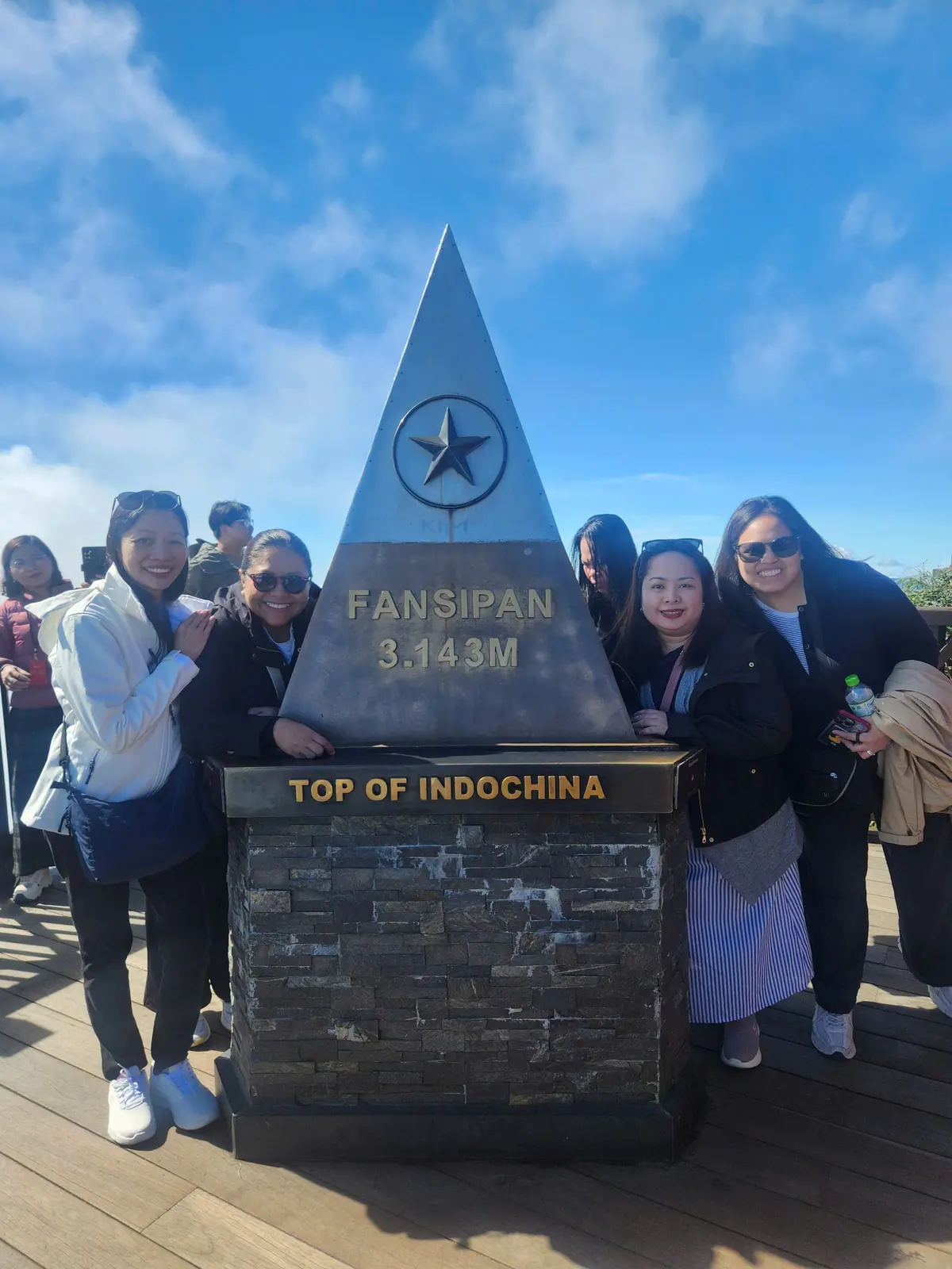 Guests at the summit of Fansipan above Sapa, 3,143 metres — the Top of Indochina